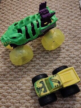 (2)Green Monster Truck Toys